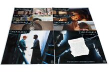 Unbreakable lobby card set
